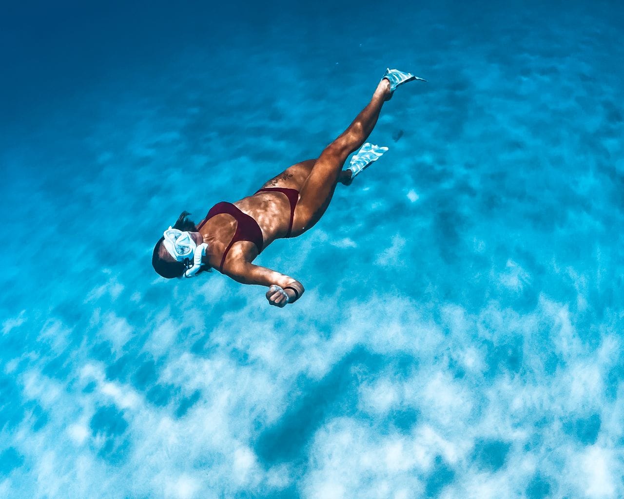 Snorkelling over a coral reef in Siargao